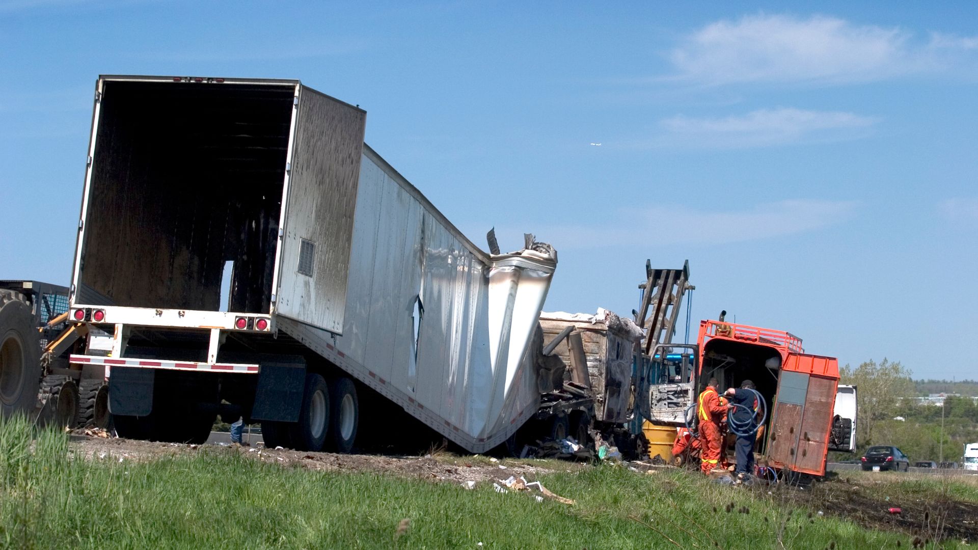 a truck on the side of the road that has been in an accident